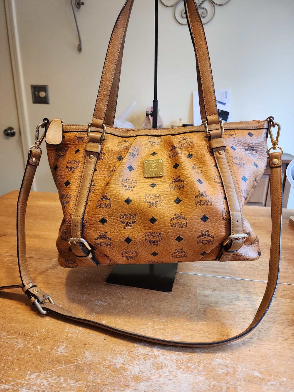 MCM Visetos Shoulder Bag in brown with a monogram print, gold-tone hardware